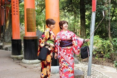 Two young women in Kimono with Selfie stick